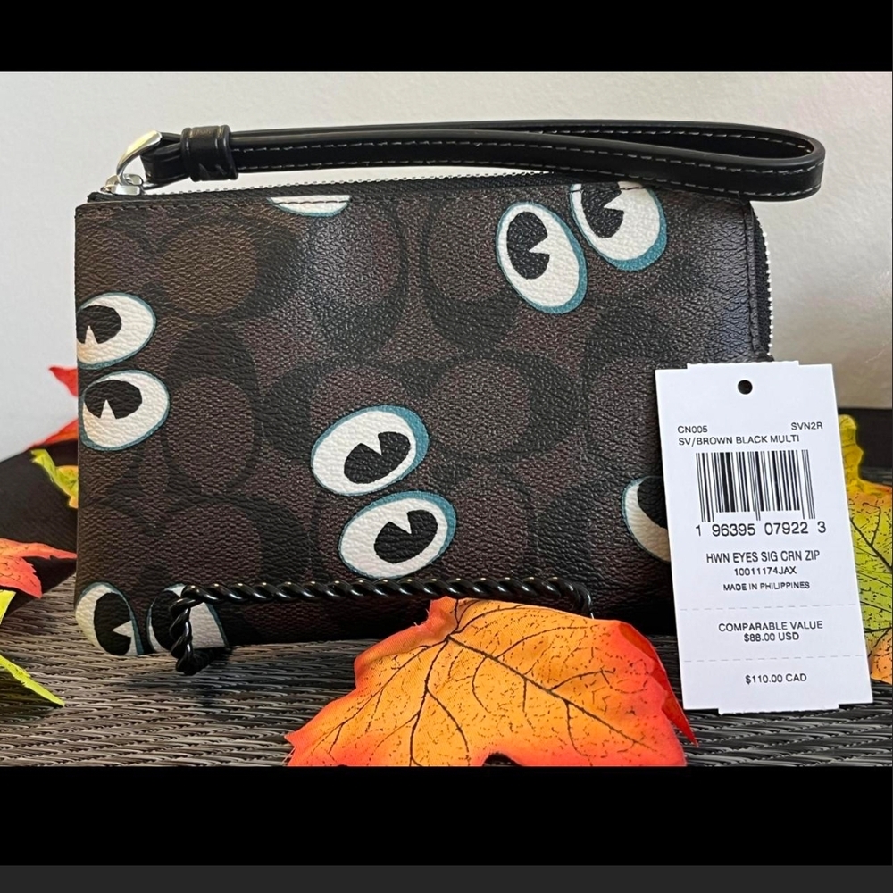 Brown and Black Wristlet with Eye Pattern